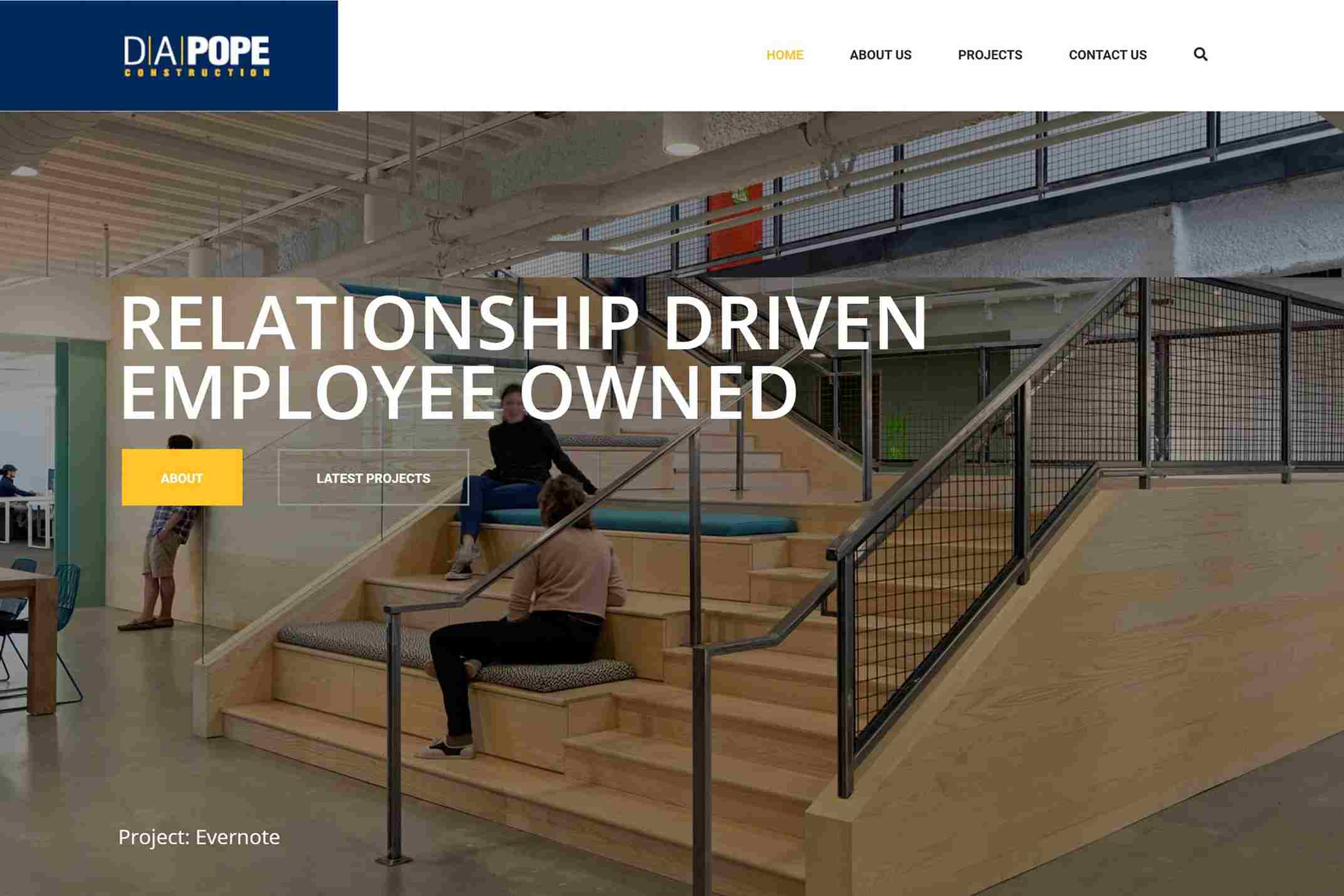 Office interior with wooden steps, people working, and overlay text about employee ownership.