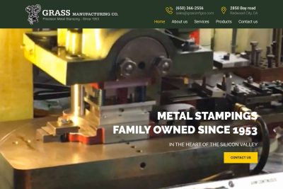 Redwood City Web Design 5 Metal stamping machine in operation at Grass Manufacturing Co. with contact info above.